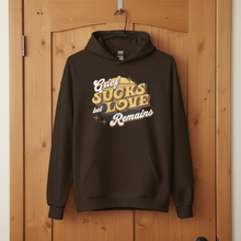 Load image into Gallery viewer, Grief Sucks but Love Remains (yellow/brown) Unisex Hoodie