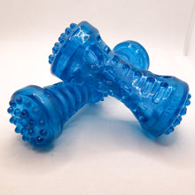 Load image into Gallery viewer, Angled side views of two clear thermoplastic rubber dog bones. Picture shows texture and size differences in the tow bones. Displayed on white background.