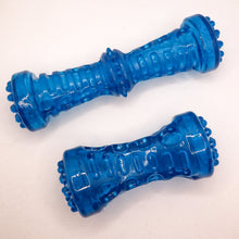 Load image into Gallery viewer, Side by side view of two clear thermoplastic rubber dog bones. Picture shows texture and size differences in the tow bones. Displayed on white background.