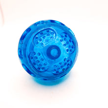 Load image into Gallery viewer, Picture of blue clear thermoplastic textured ball with squeaker. Displayed on white background.
