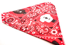 Load image into Gallery viewer, Close up angled view of Classic red bandana print over-the-collar bandana. Has classic bandana pattern with black and white dogs and white bones. Displayed on a white background.