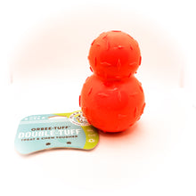 Load image into Gallery viewer, Picture of Diamond Plate Double-Tuff dog chew toy. Toy is orange with two attached balls (looks like a snowman). Ball has texture and is connected to card tag. Displayed on white background.