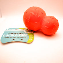 Load image into Gallery viewer, Side view of Diamond Plate Double-Tuff dog chew toy. Toy is orange with two attached balls (looks like a snowman). Ball has texture and is connected to card tag. Displayed on white background.