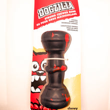 Load image into Gallery viewer, Overhead view picture of Dogzilla Strong Chewer Bone dog toy. Bone is hard black rubber with red accents. Displayed on a white background with card tag.