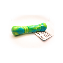 Load image into Gallery viewer, Side view of Crack N' Fetch Stick dog chew and fetch toy. Yellow, blue and green bone shaped toy attached to card tag which say "I Crackle". Displayed on white background.