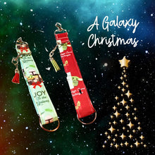 Load image into Gallery viewer, Charmable Wristlet Keychains - A Galaxy Christmas