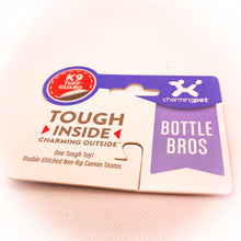 Load image into Gallery viewer, Picture of Bottle Bro Rhino tag.  Says Tough Inside, Charming Outside.  One Tough Toy! Double-Stitched Non-Rip Canvas Seams. 
