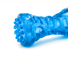 Load image into Gallery viewer, Close up side view of the end of small clear thermoplastic rubber dog bone. Picture shows texture and shape of the bone. Displayed on white background.
