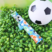 Load image into Gallery viewer, Charmable Wristlet Keychains - Sports Collection
