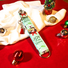 Load image into Gallery viewer, Charmable Wristlet Keychains - A Galaxy Christmas
