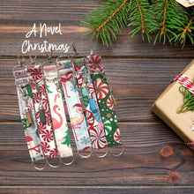 Load image into Gallery viewer, Charmable Wristlet Keychains - A Novel Christmas
